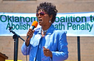 Recently elected as OK-CADP chair, longtime anti-death penalty activist and former state Senator Connie Johnson, speaks at a “Halt Executions” rally outside the state Capitol.  Photo by Mary E. Sine. 